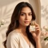 Woman holding Golden Gulnaar Eau De Parfum by Mandakani Perfumers