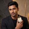 Junoon Eau de Parfum 50ml for Men & Unisex – Mandakani Perfumers Junoon Eau de Parfum 50ml for men and unisex by Mandakani Perfumers with male model holding perfume bottle