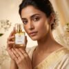 parijat-eau-de-parfum-women-lifestyle-mandakani Woman holding Parijat Eau De Parfum 50ml by Mandakani Perfumers