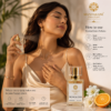 Model applying Tropical Eden EDP 50ml perfume on pulse points and clothing