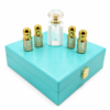 luxury-perfume-gift-box-turquoise-mandakani Turquoise luxury perfume gift box with premium fragrance bottles